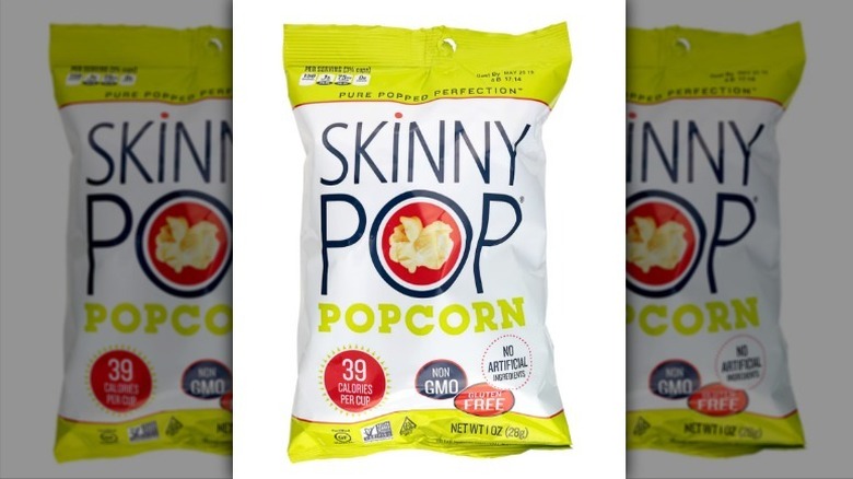 SkinnyPop popcorn on white background
