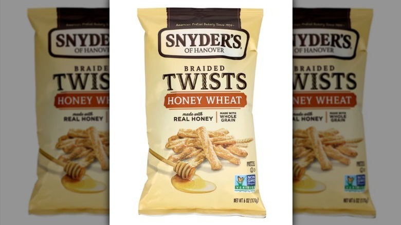 Snyder's honey wheat pretzels on white background