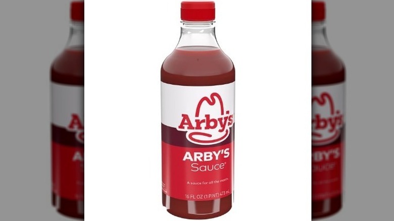 Arby's sauce with a red and white label on white background