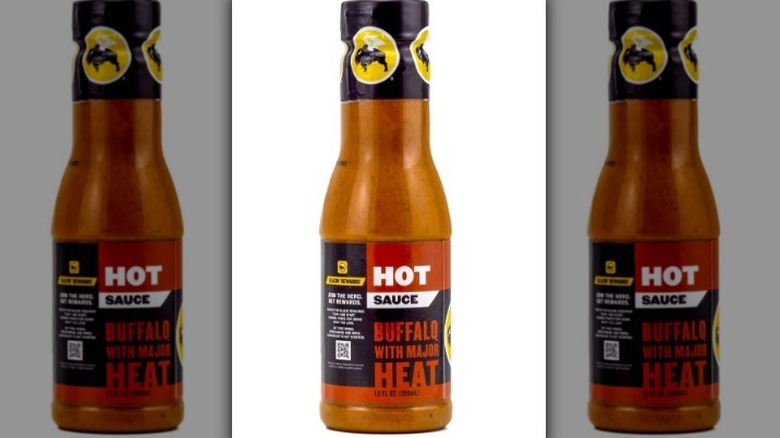 Buffalo Wild Wings hot sauce with a red and black label on white background