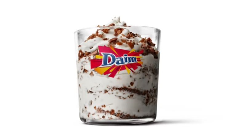 A glass with the Daim logo full of a Daim McFlurry