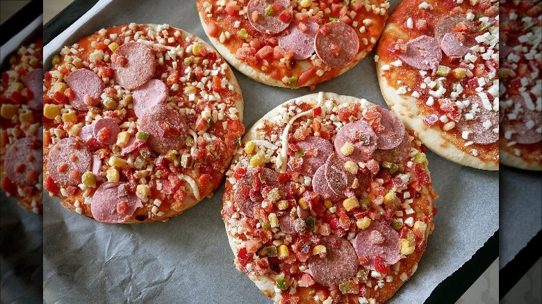 frozen pizzas on tray