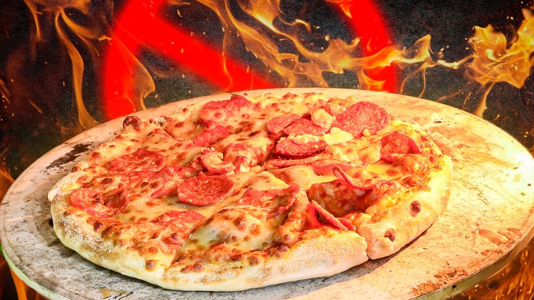 Pizza on fiery stone