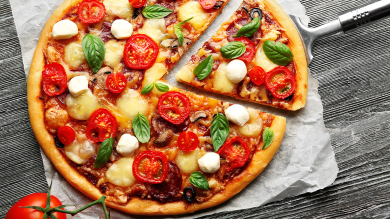 pizza on parchment paper