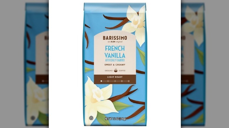 French vanilla blend in a blue bag with vanilla flowers on it on white background.