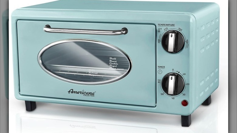 Countertop toaster oven against white background.