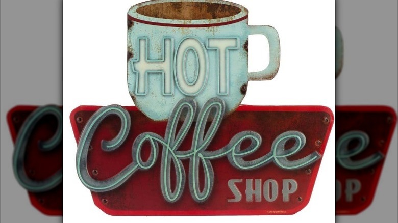 Hot Coffee Shop sign against white background.