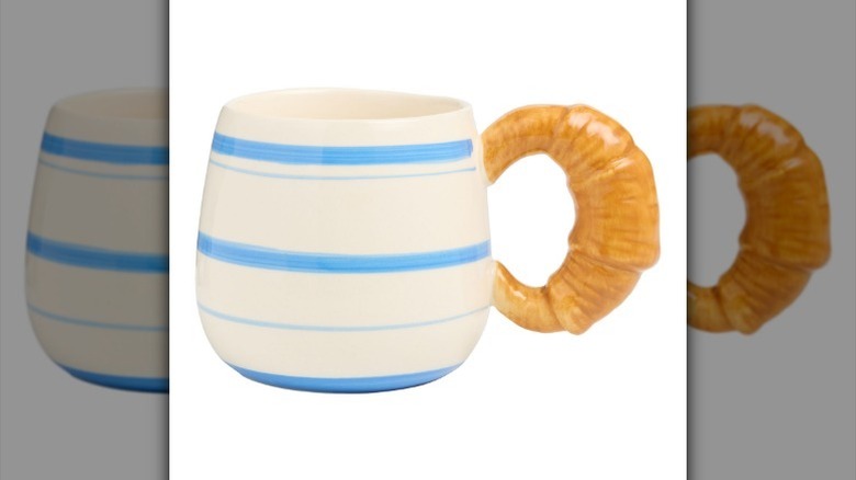 Croissant coffee mug on white background