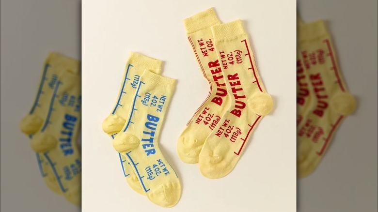 Red and blue butter socks on beige background