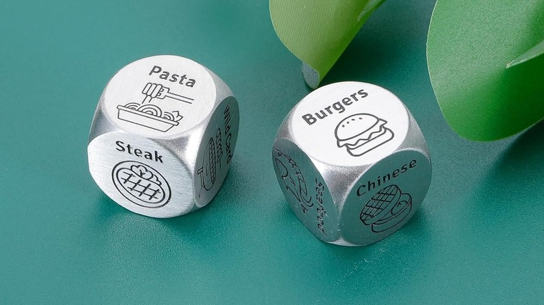 Food dice on green surface
