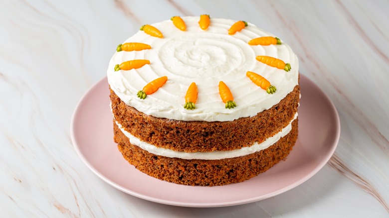 Whole carrot cake on plate