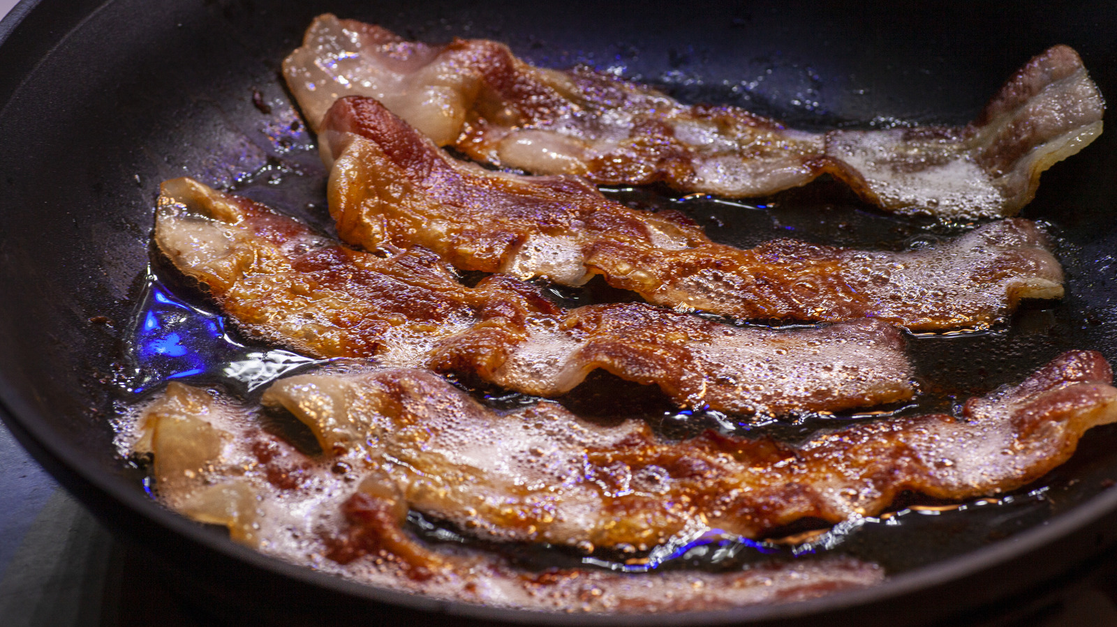 18 Delicious Ways To Use Leftover Bacon Grease
