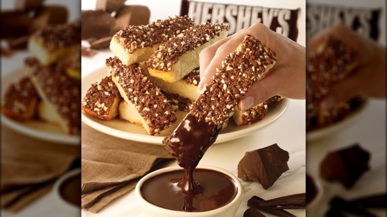 Hershey's Chocolate Dunkers being dipped