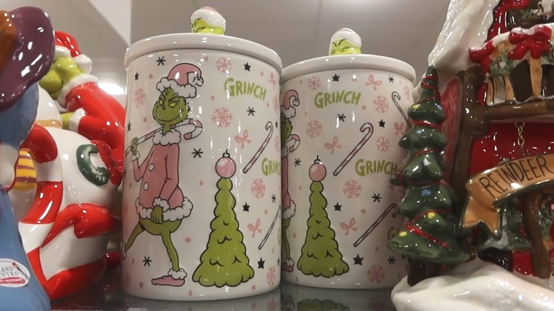 Grinch cookie jar on a HomeGoods shelf