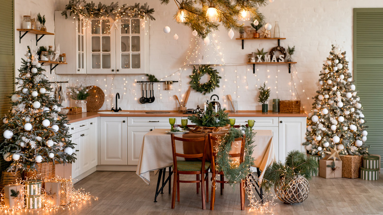 Kitchen and table decorated for Christmas and winter