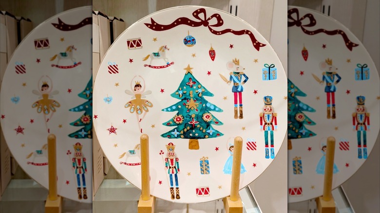 Nutcracker ballet plate on a HomeGoods shelf stand