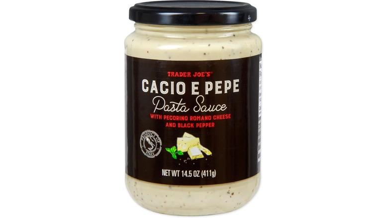 Jar of Trader Joe's Cacio E Pepe Pasta Sauce against white background.