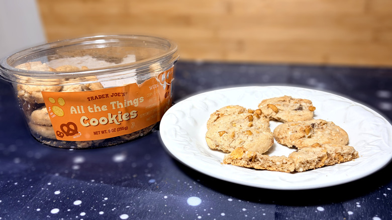 All the things cookies on plate next to product package
