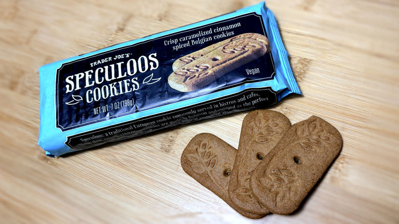 Speculoos cookies on cutting board next to product package