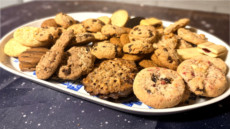 variety of trader joes cookies piled on a platter