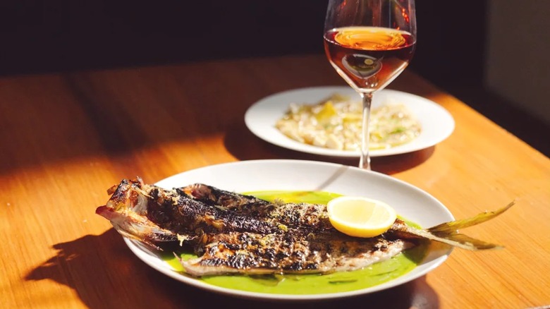 Two dishes and wine from Vern's in Charleston