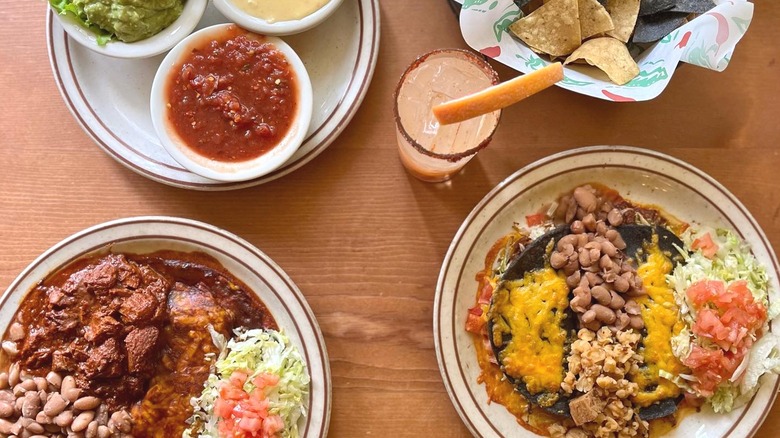 Plates of various Mexican dishes from The Shed