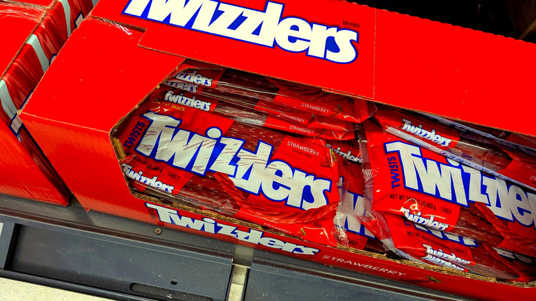 Packages of Twizzlers on display in a supermarket