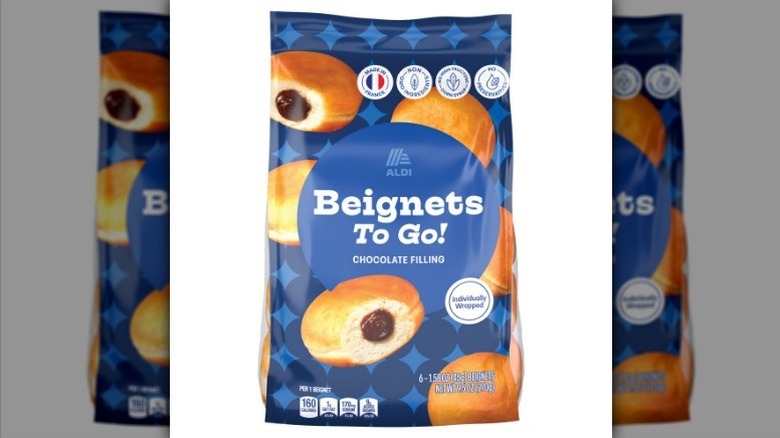Beignets to go on white background