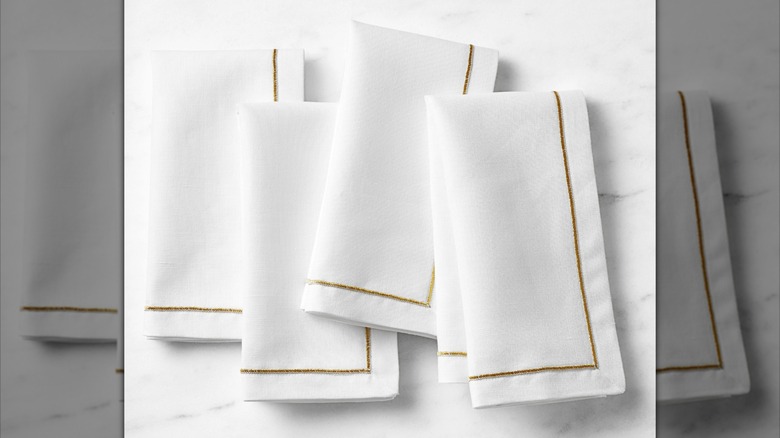 Gold Border Napkins in white