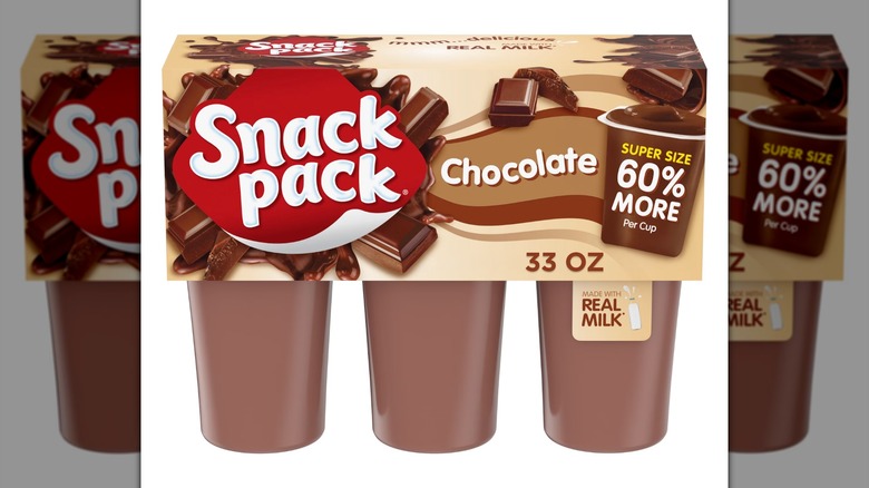A six-pack of Snack Pack Super Size Chocolate Pudding on a white background