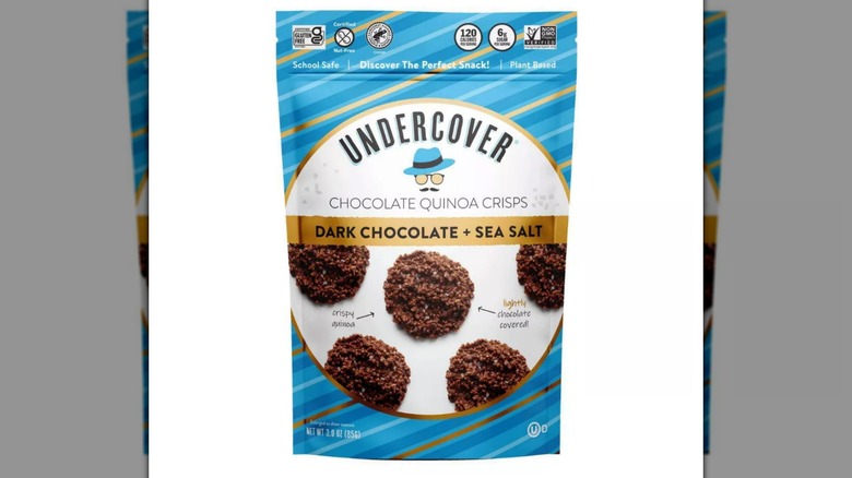 A bag of Undercover Dark Chocolate and Sea Salt Quinoa Crisps on a white background