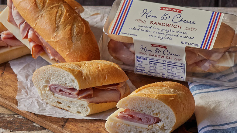 Ham and cheese baguette sliced on wax paper