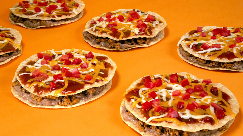 Mexican pizzas on orange background