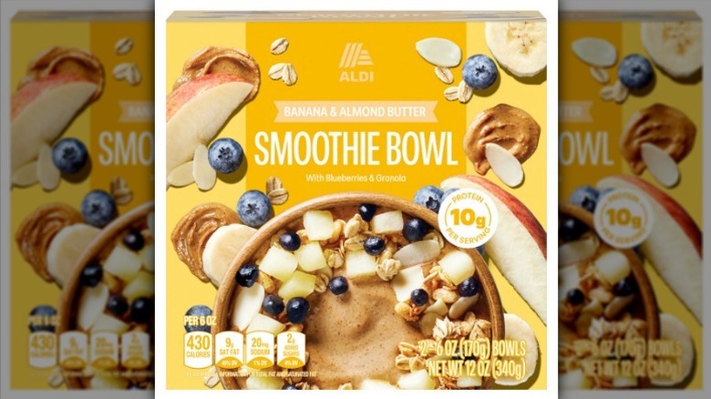 Banana almond butter smoothie bowl on white background