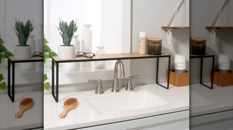 Over sink storage shelf in kitchen