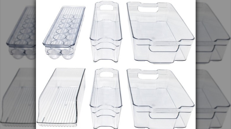 Clear, stacked storage bins against white background.