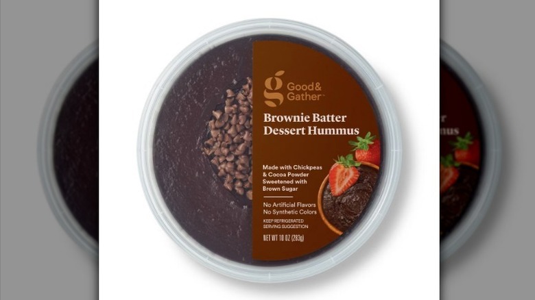 Brownie batter hummus with brown label on white background