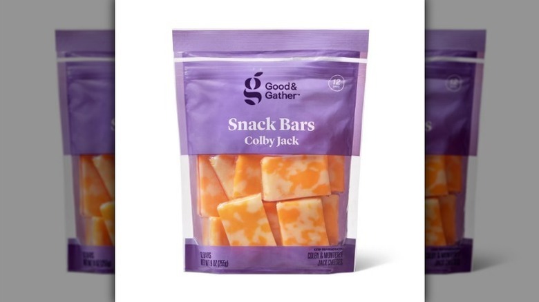 Colby Jack snack bars in purple bag on white background