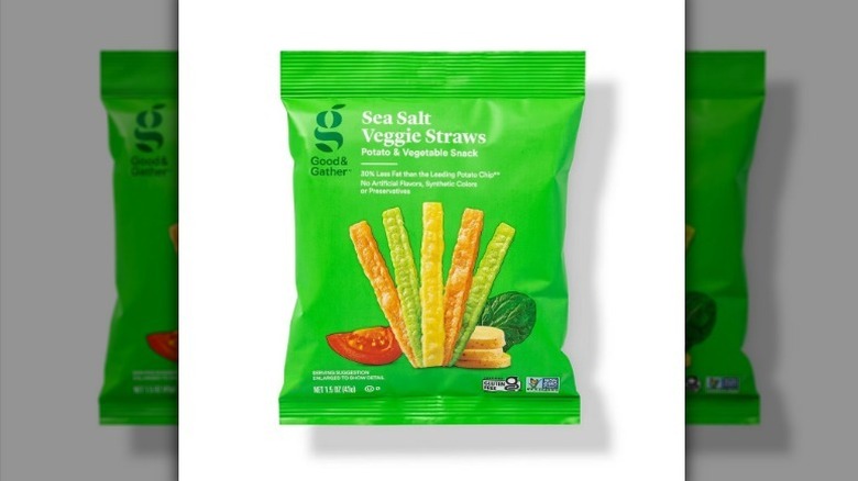 Sea salt veggie straws in bright green bag on white background
