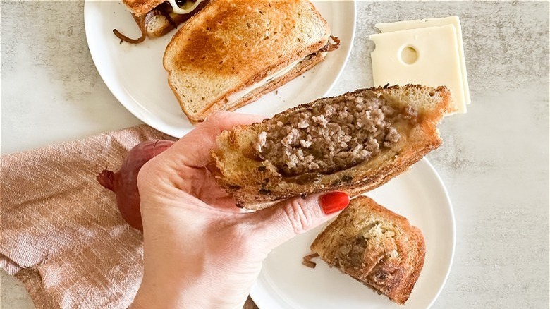 Sliced Swiss patty sandwich