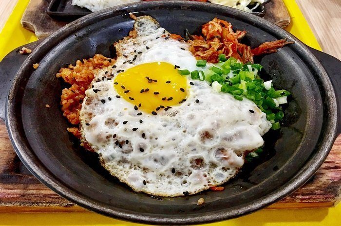 22 Ways to Transform Humble Fried Eggs into a Decadent Dinner