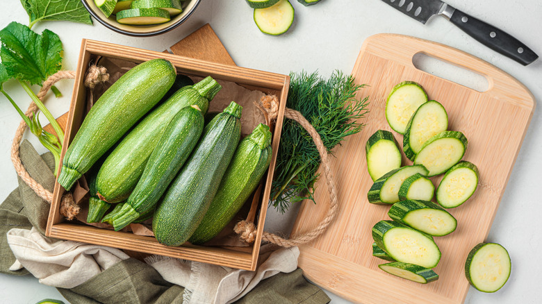Whole and sliced zucchini