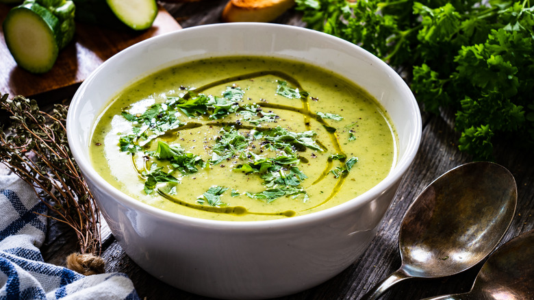 Zucchini soup drizzled with oil