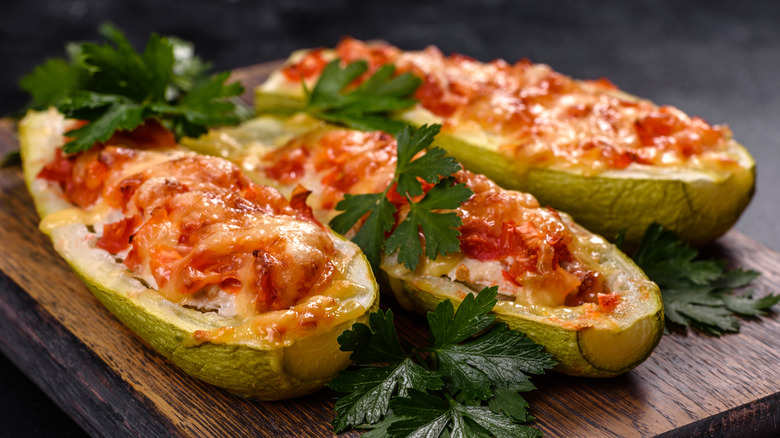 Three stuffed zucchini