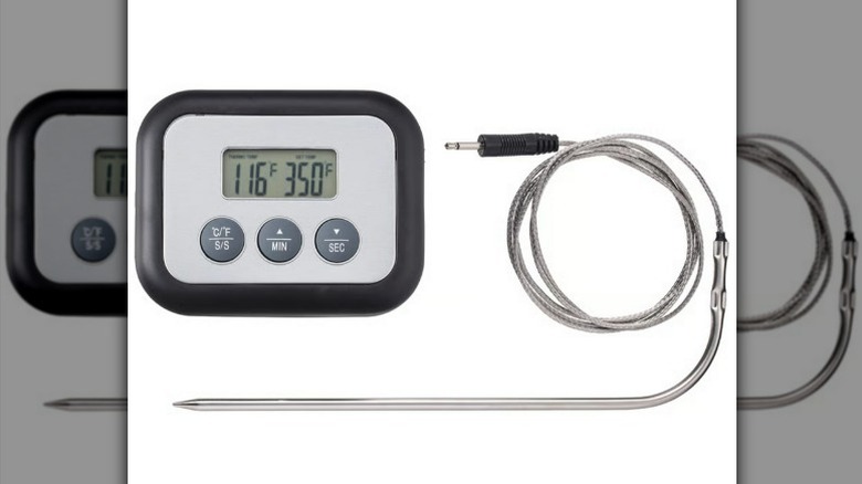 Meat thermometer on white background
