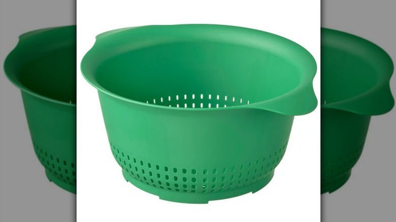 Colander on white background
