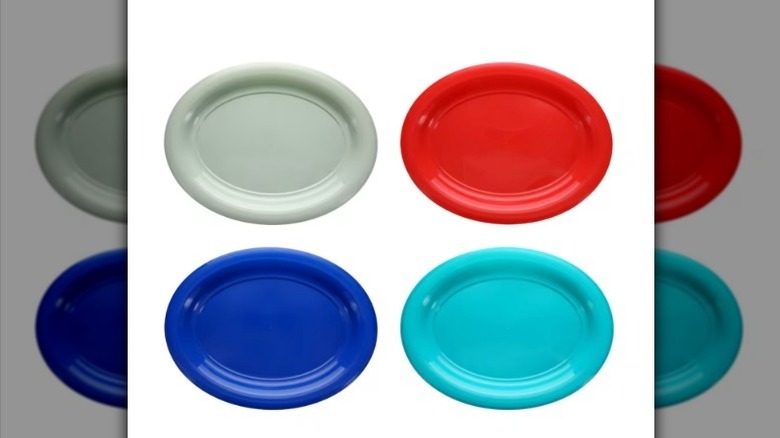 Serving trays in gray, red, dark blue, and aqua blue on white background