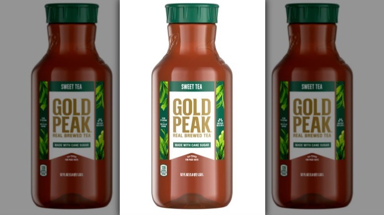 Gold Peak sweet tea with a green label and lid on white background