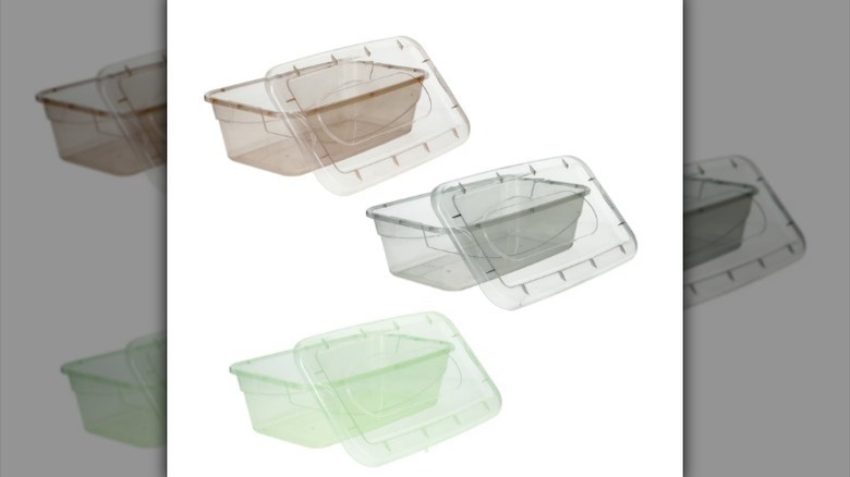 Transparent storage boxes in tan, gray, and green on white background