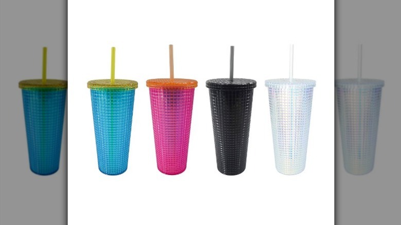 Tile print iridescent tumbler options in blue, pink, black, and white on white background